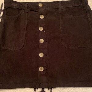 Black corduroy mini skirt
Size 12